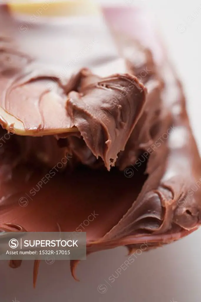 Mixing spoon with melted chocolate