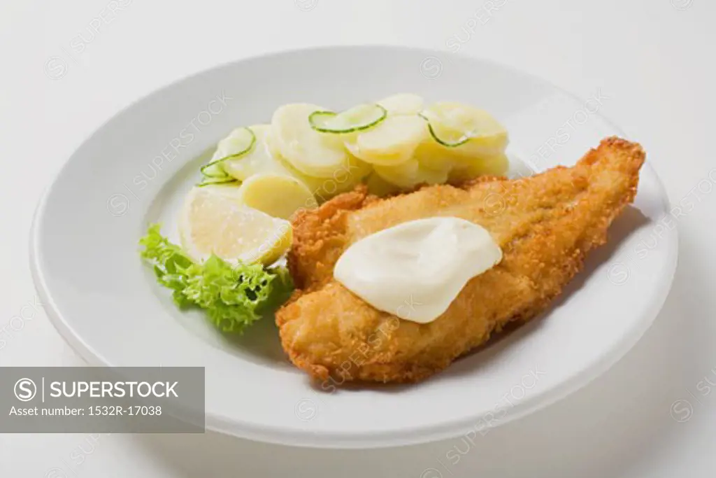 Fish fillet with mayonnaise and potato salad