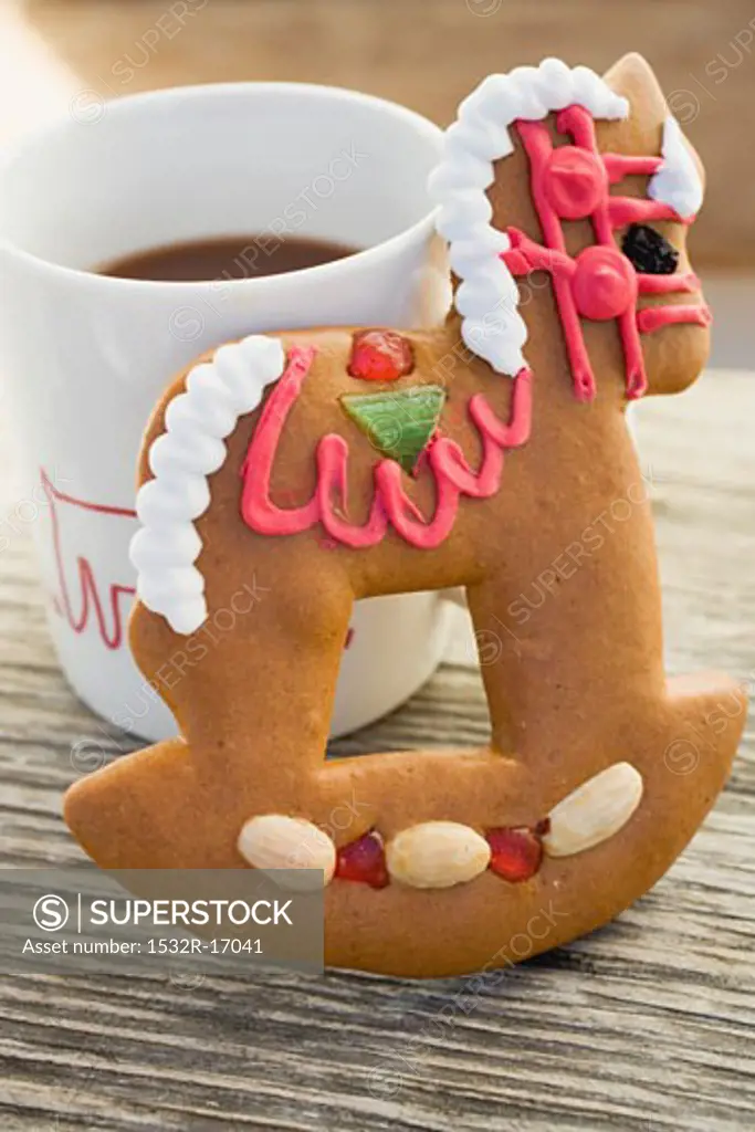 Gingerbread rocking horse and mug of cocoa