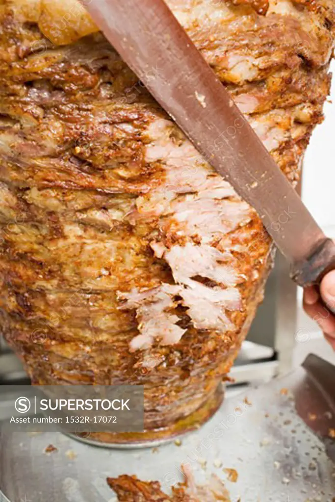 Slicing döner meat from the spit