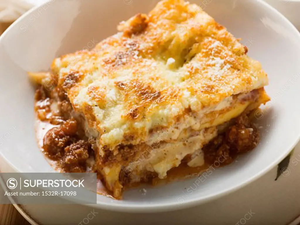 A portion of lasagne in a deep plate