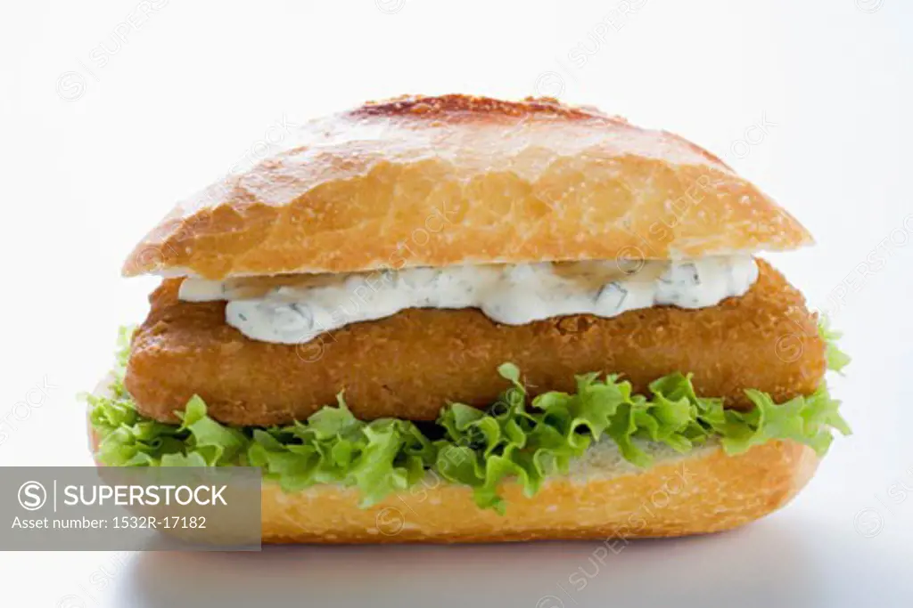 Fish burger with remoulade and lettuce