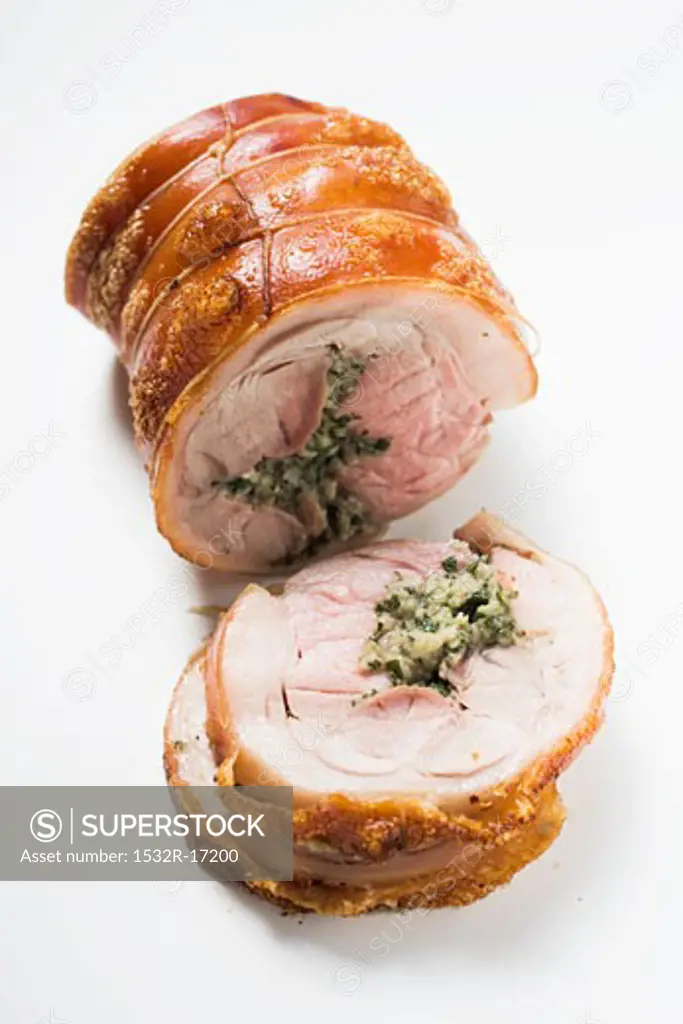 Rolled pork roast with herb stuffing and crackling