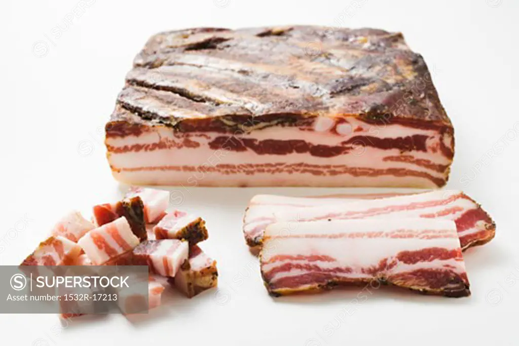 Smoked belly bacon, a piece, slices and diced