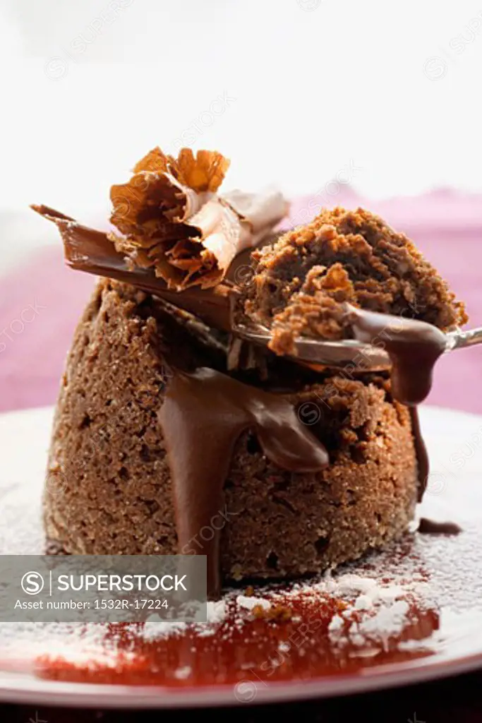 Chocolate soufflé filled with chocolate sauce