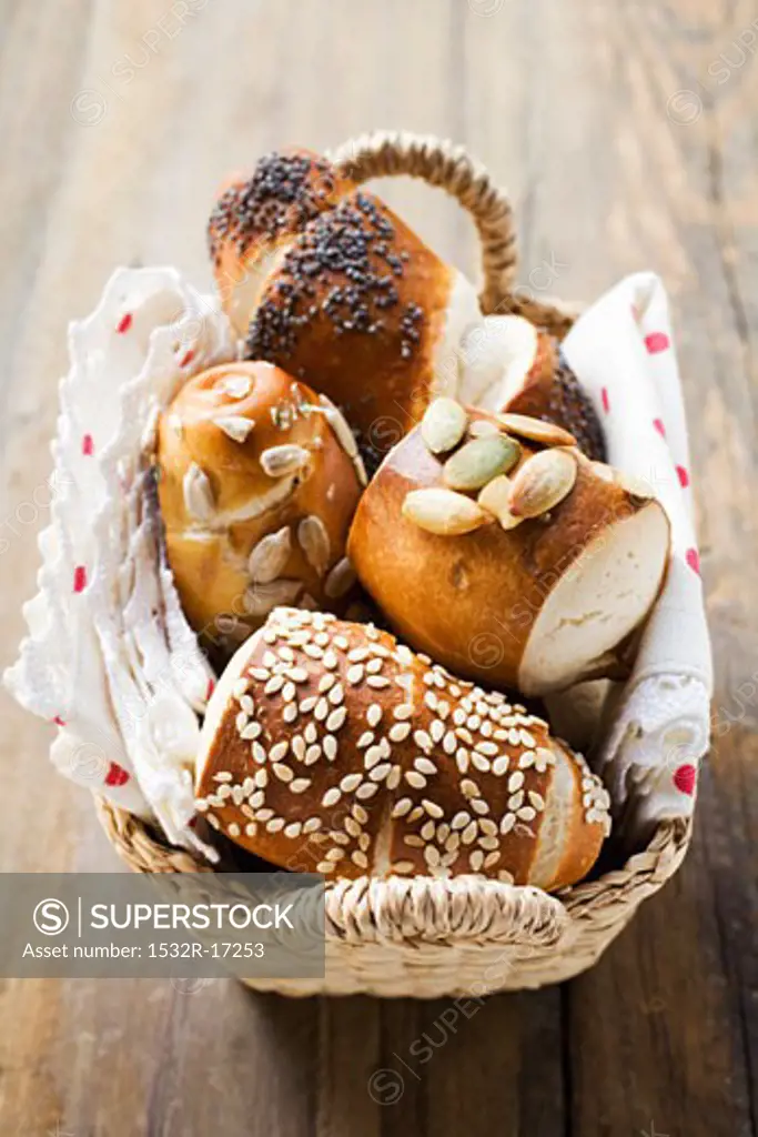 Assorted pretzel rolls (or lye rolls) in bread basket