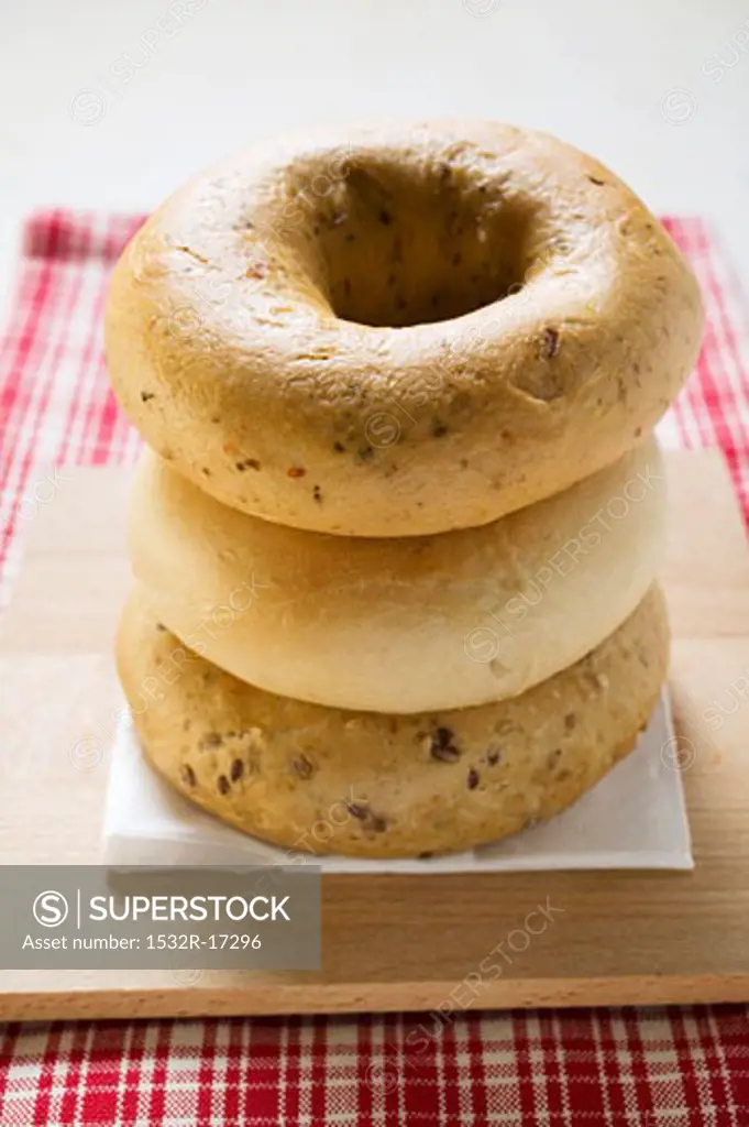 Three different bagels, in a pile