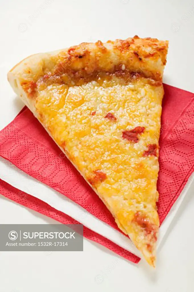 Slice of American-style pizza Margherita on napkins