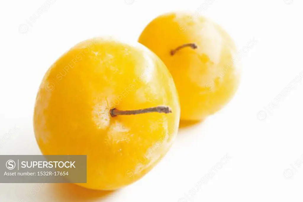 Two yellow plums