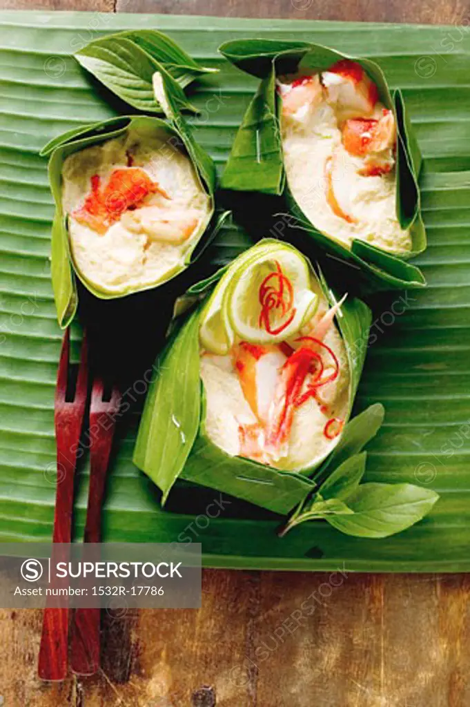 Crabmeat with coconut sauce in banana leaf