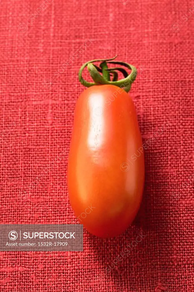 A 'date' tomato on red background