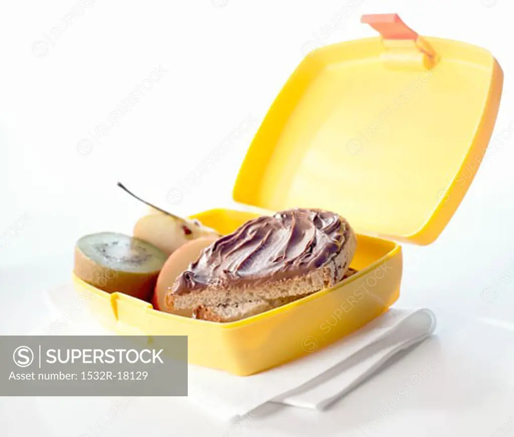 Nutella sandwiches and fruit in lunch box
