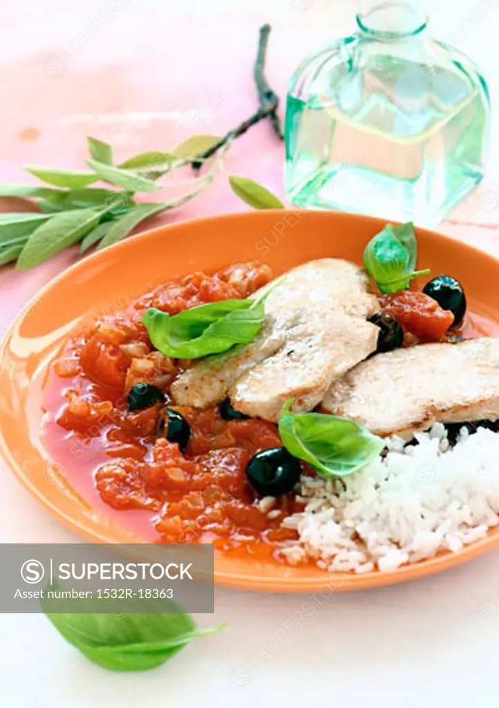 Turkey breast in olive and tomato sauce with rice