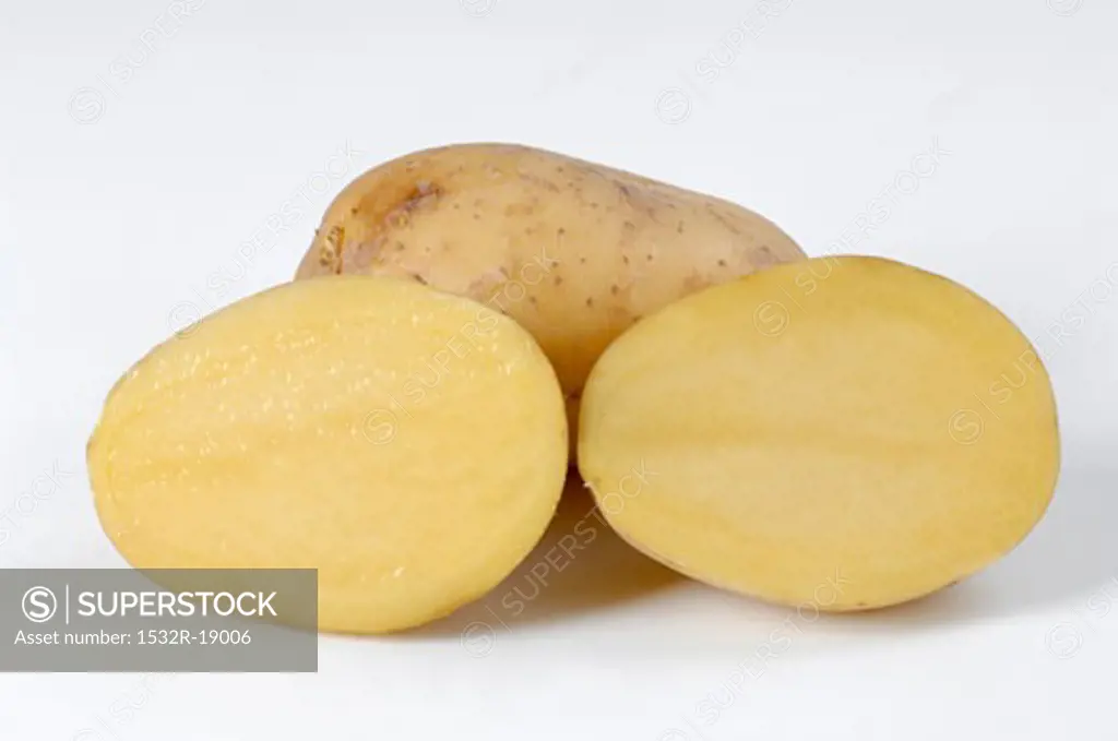 A whole potato and two potato halves