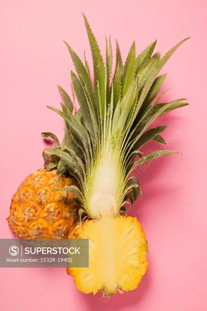 Baby pineapple, halved