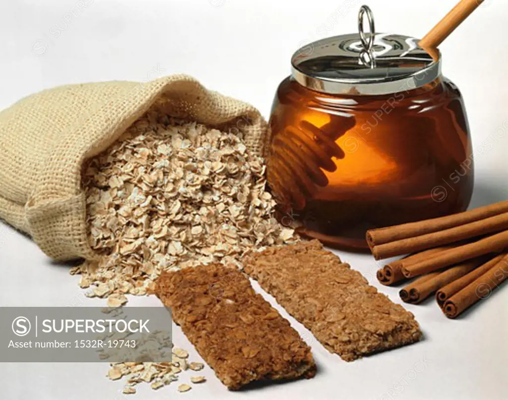 Still life with rolled oats, flapjacks, cinnamon and honey