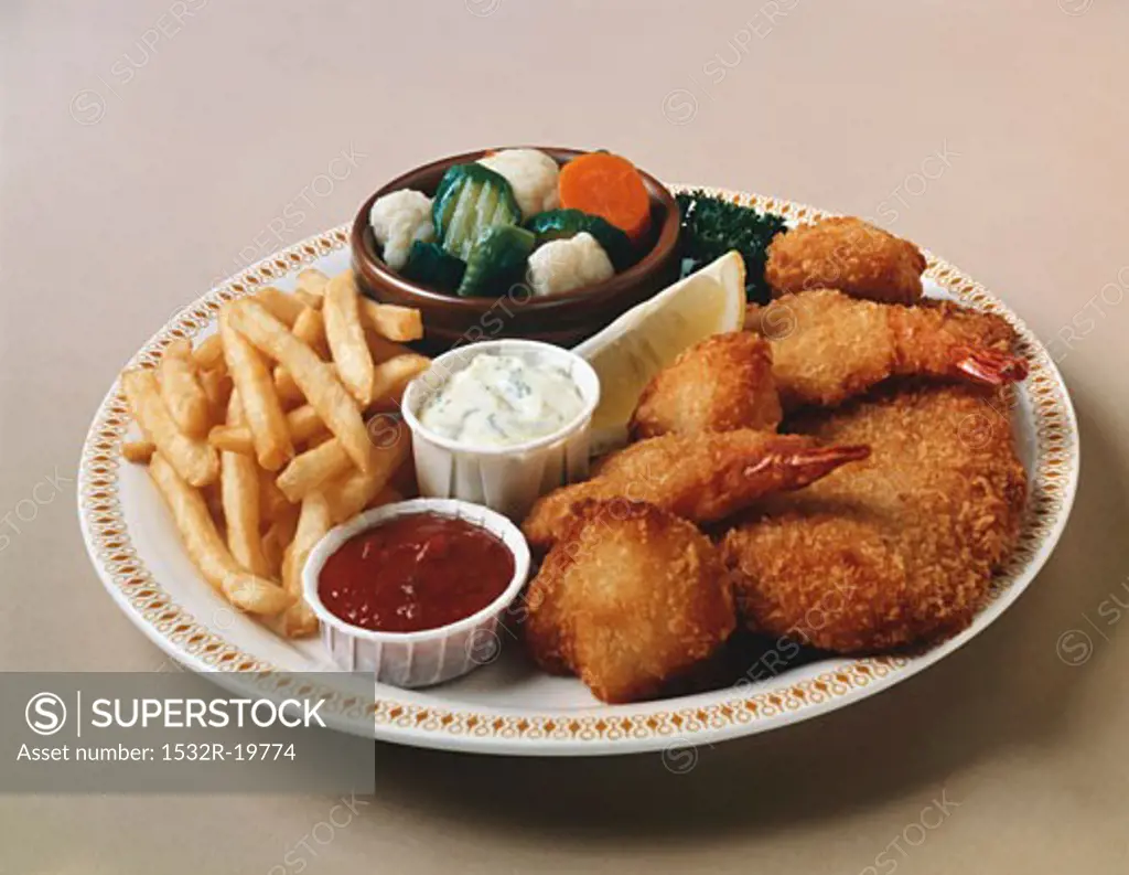 Breaded prawns & fish nuggets with dips, chips & vegetables
