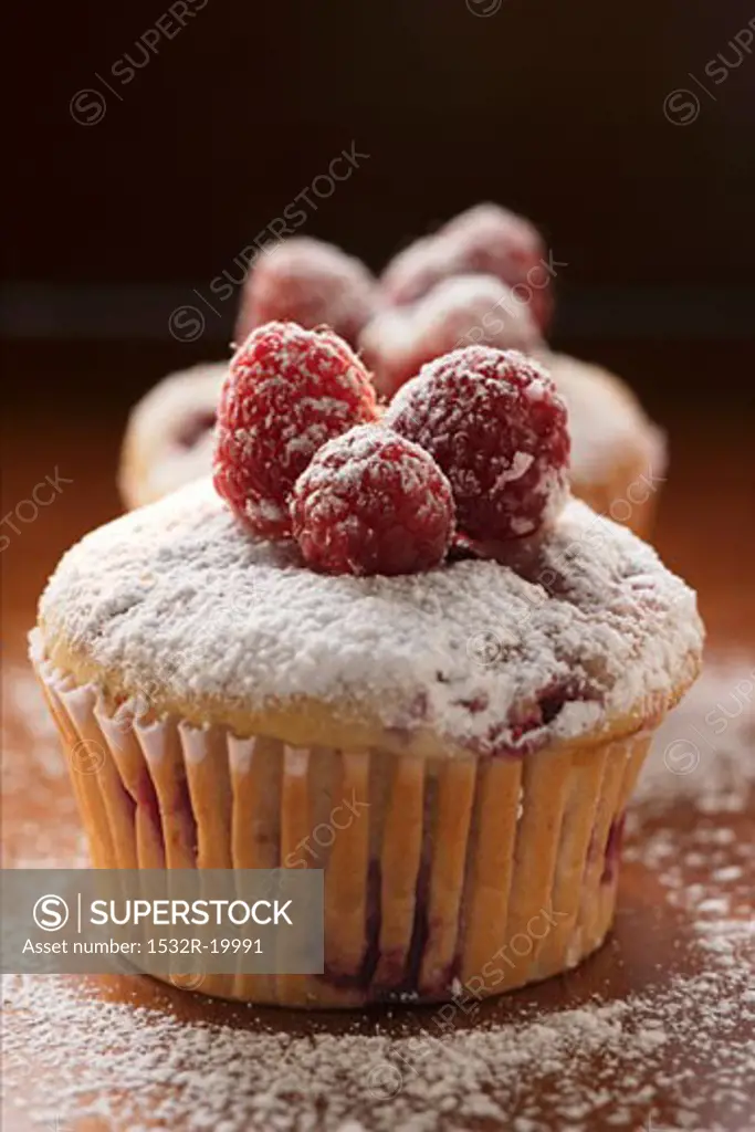 Raspberry muffins with icing sugar