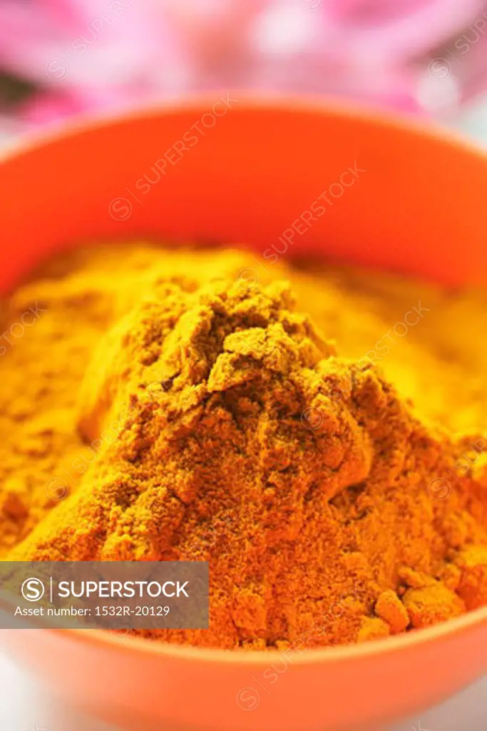 Turmeric in orange bowl