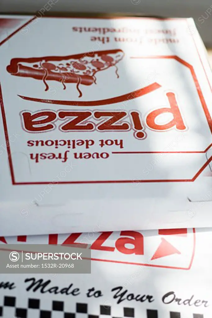Pizzas in pizza boxes