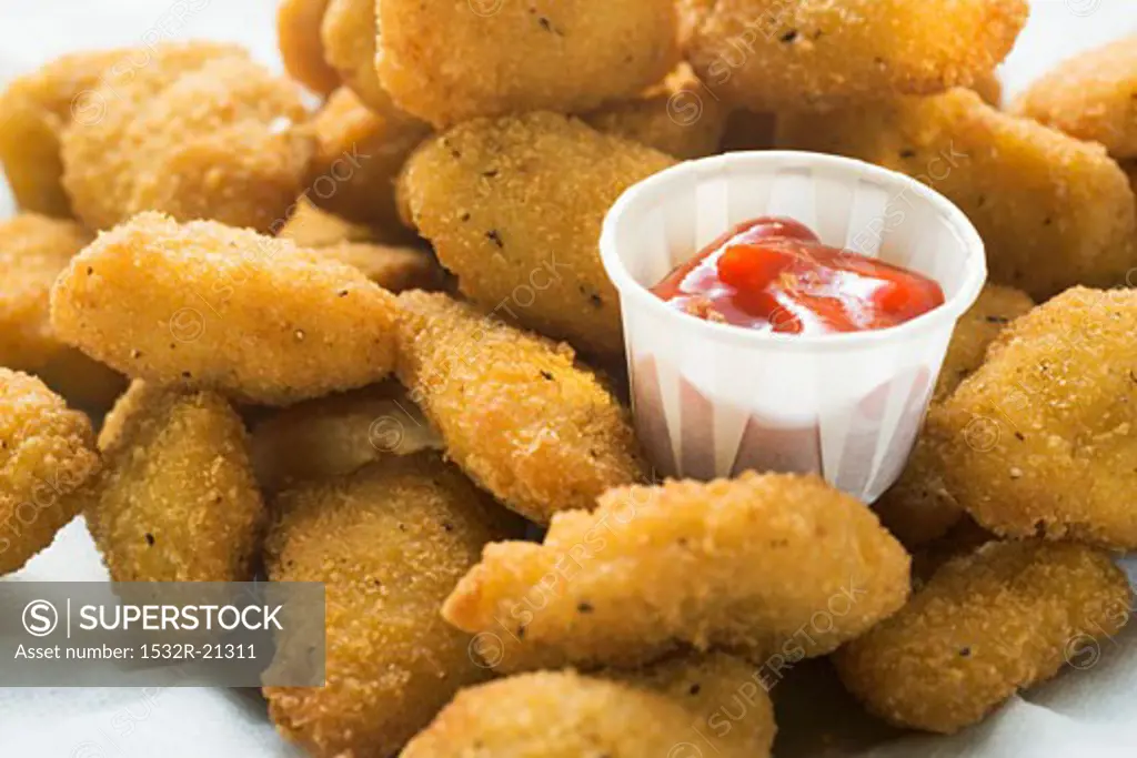 Chicken nuggets with ketchup