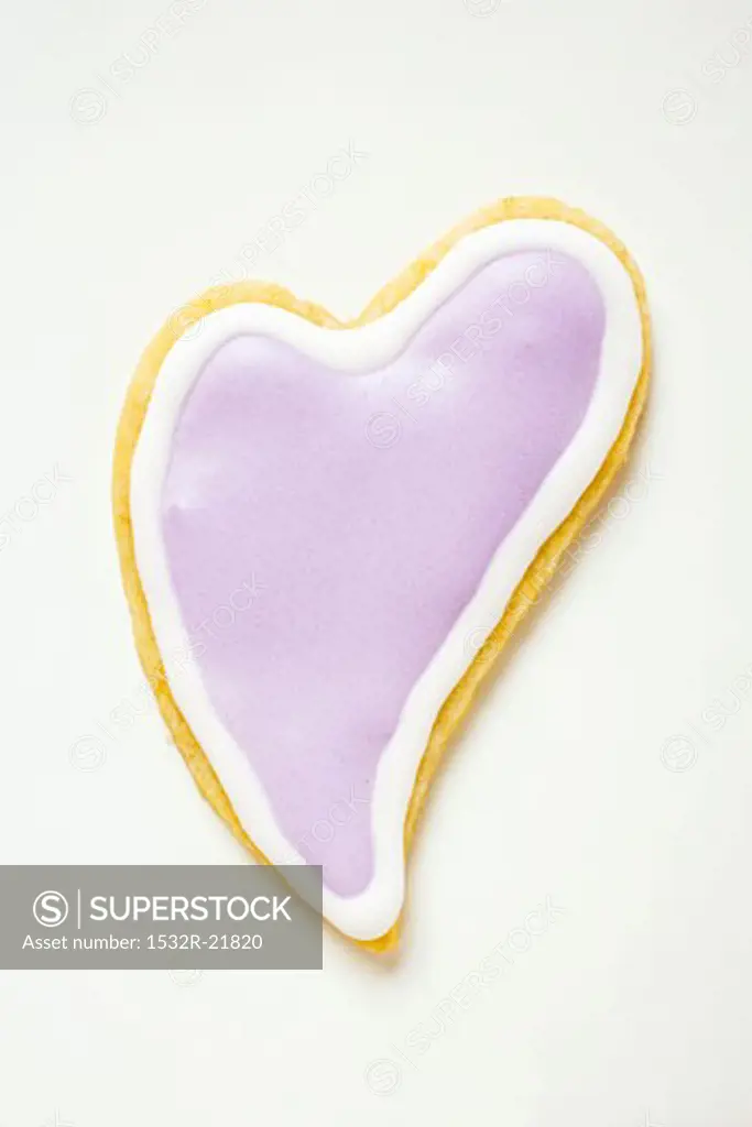 Heart-shaped biscuit with lilac icing