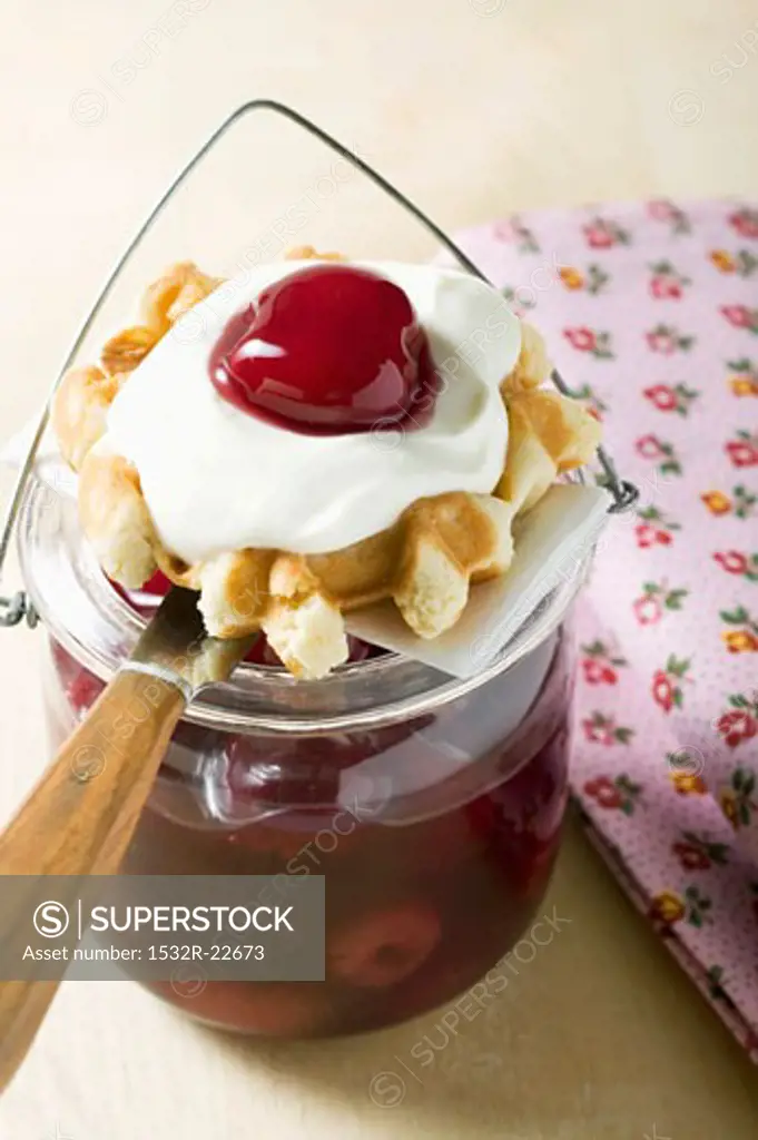 Waffle with vanilla cream and cherries