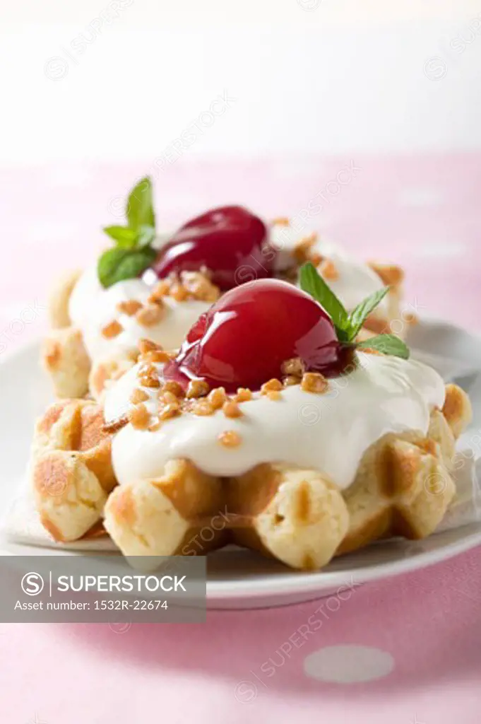 Waffles with vanilla cream and cherries