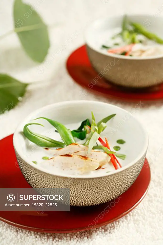Coconut soup with chicken breast