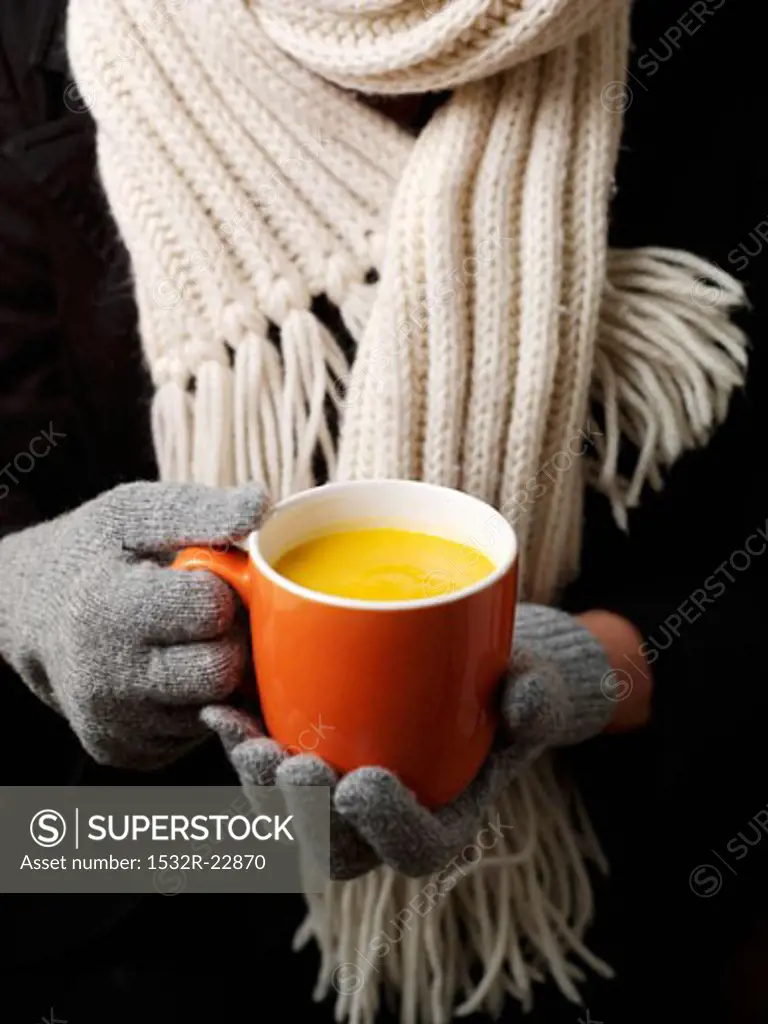 A cup of pumpkin soup