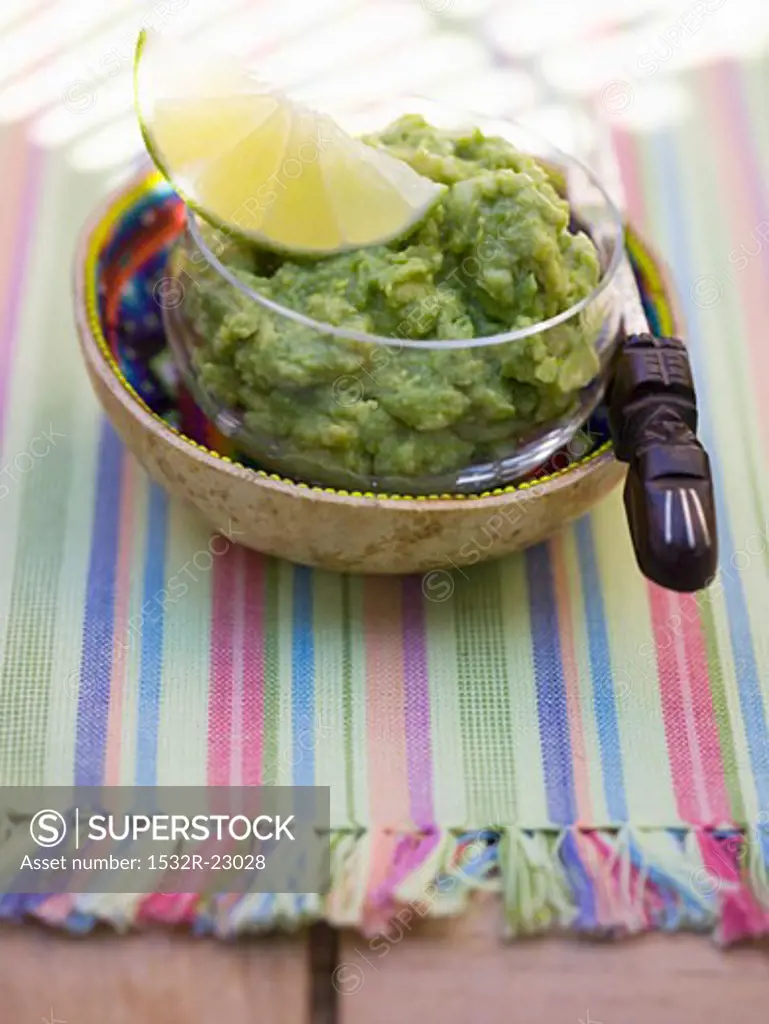 Guacamole in a small glass bowl