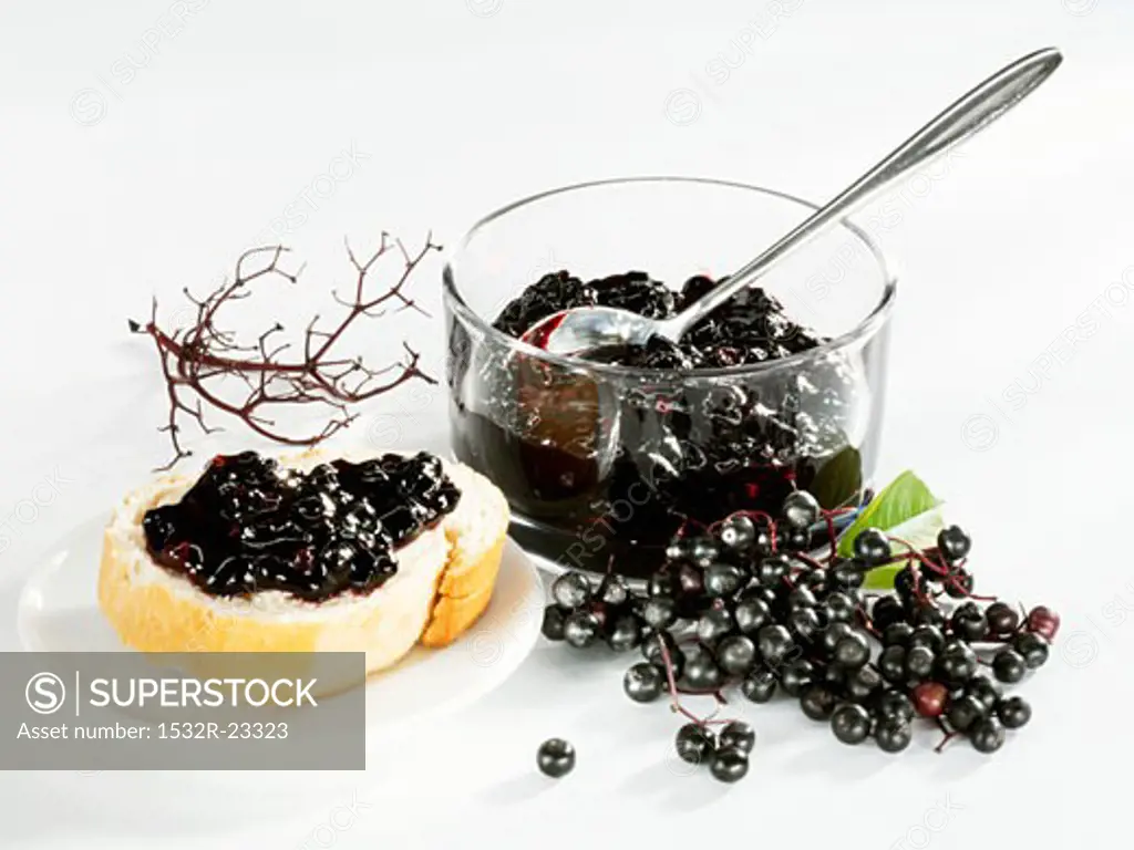 Elderberry jam on bread and in a small glass bowl