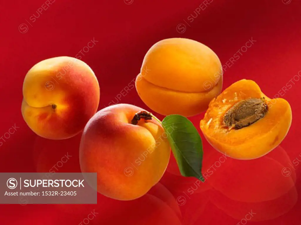 Three whole and one half apricot