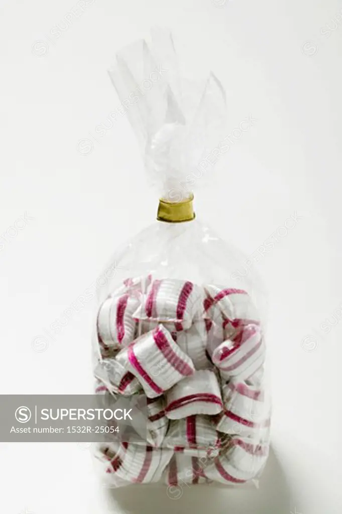 Cherry mint sweets in cellophane bag