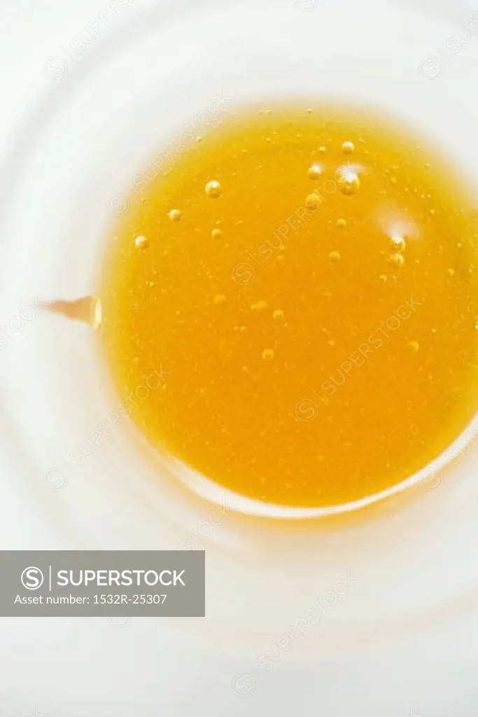 Honey in small bowl from above