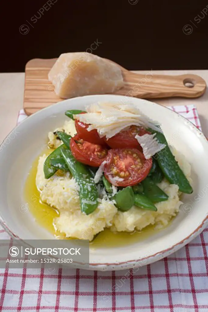 Mashed potato with mangetout, tomatoes and Parmesan