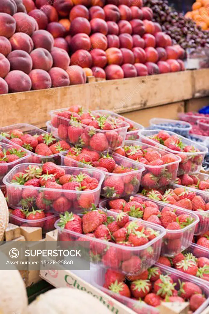 Fruit stall with strawberries, peaches and nectarines