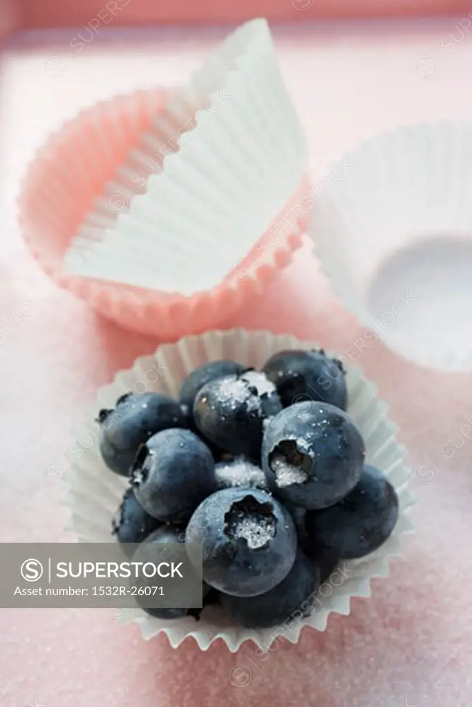 Sugared blueberries in sweet case