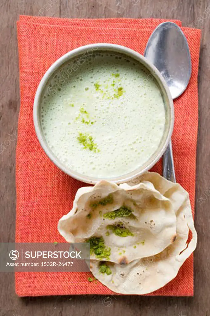 Curry soup with poppadams (India)