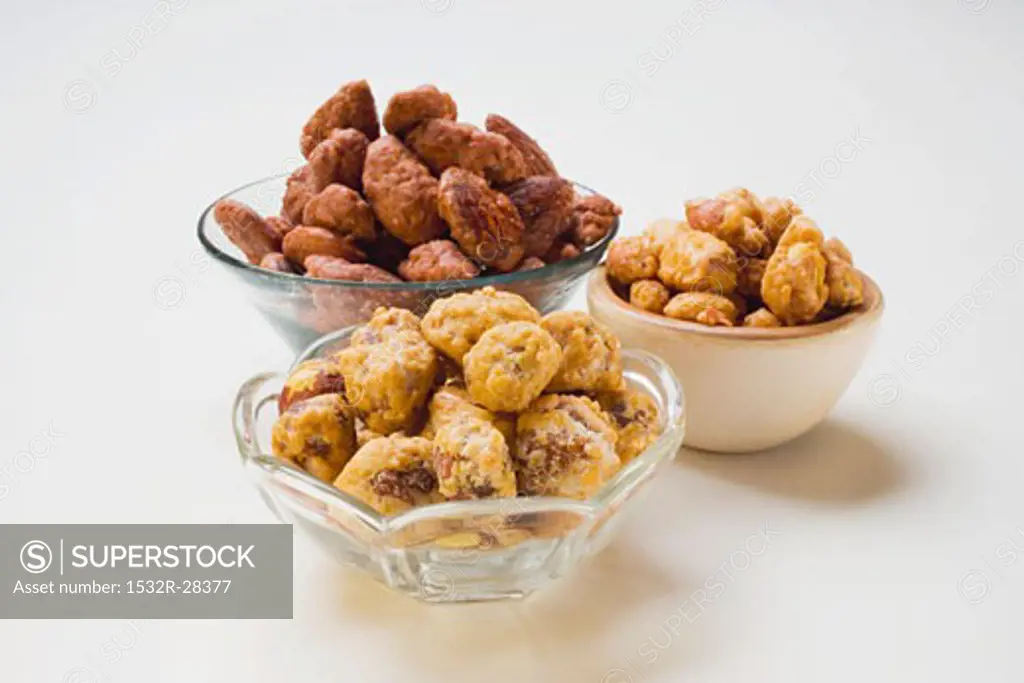 Assorted nuts to nibble in bowls