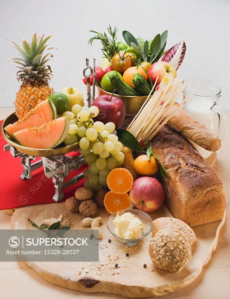 Fresh vegetables, fruit, butter, nuts and wholemeal bread