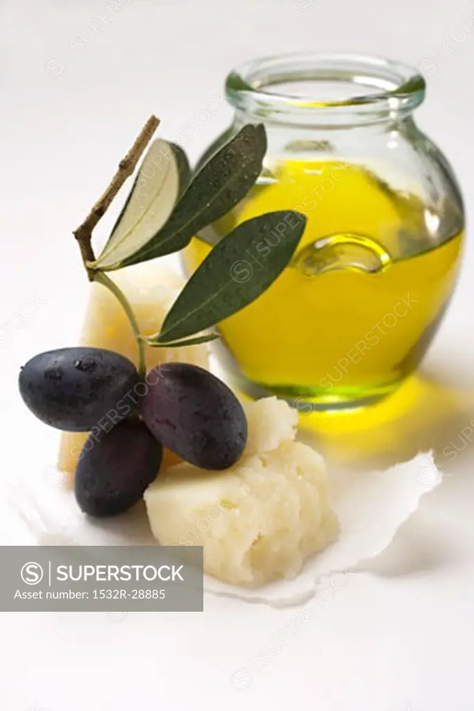 Black olives on twig, Parmesan and olive oil