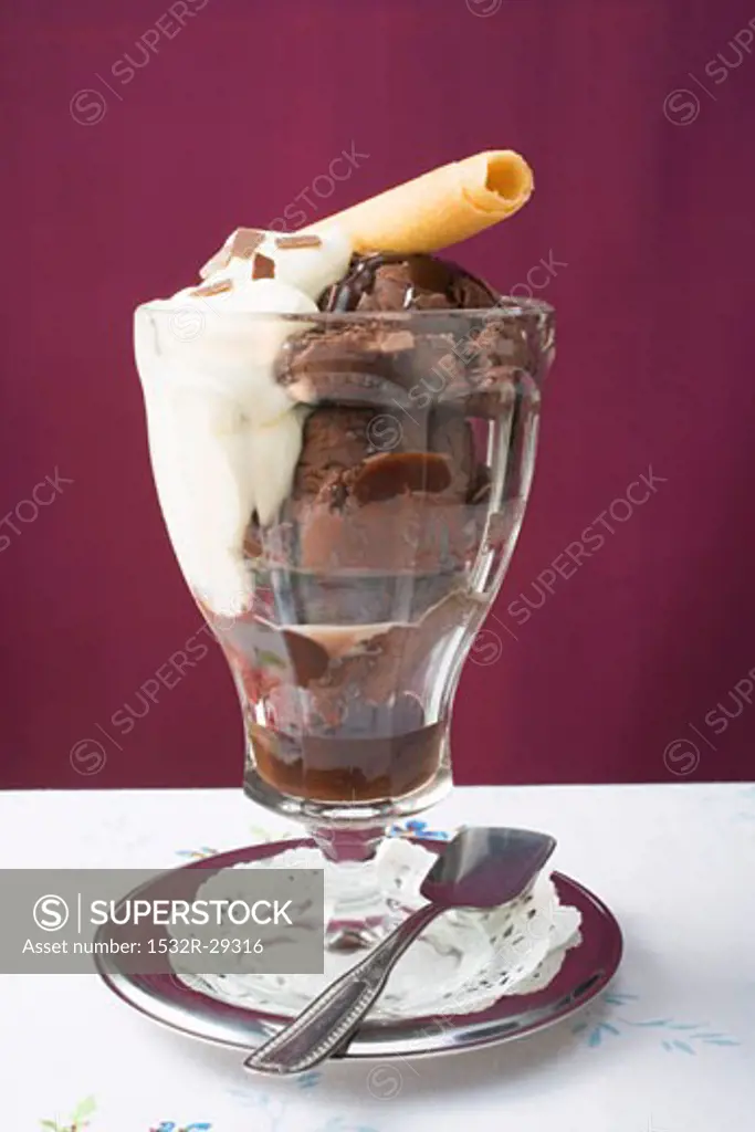 Sundae of chocolate ice cream, cream & wafer curl