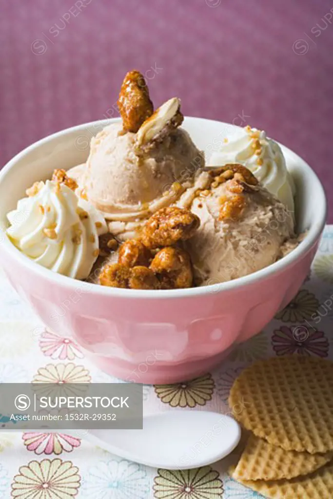 Nut ice cream with caramelised nuts and cream