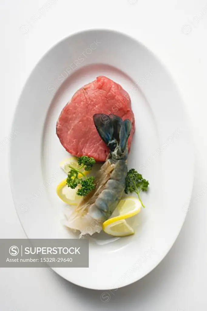 Beef fillet and king prawn with parsley and lemon