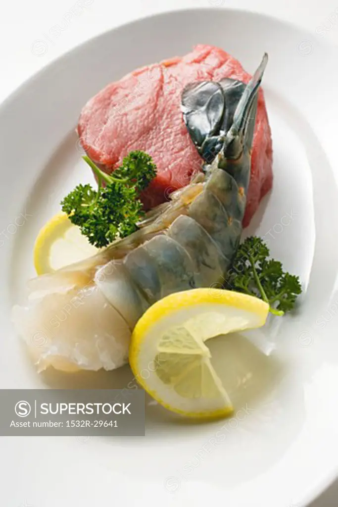 Beef fillet and king prawn with parsley and lemon