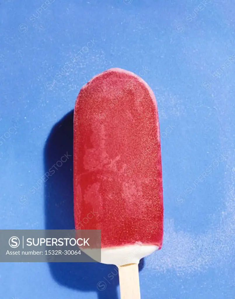 Raspberry-coated vanilla ice cream on stick