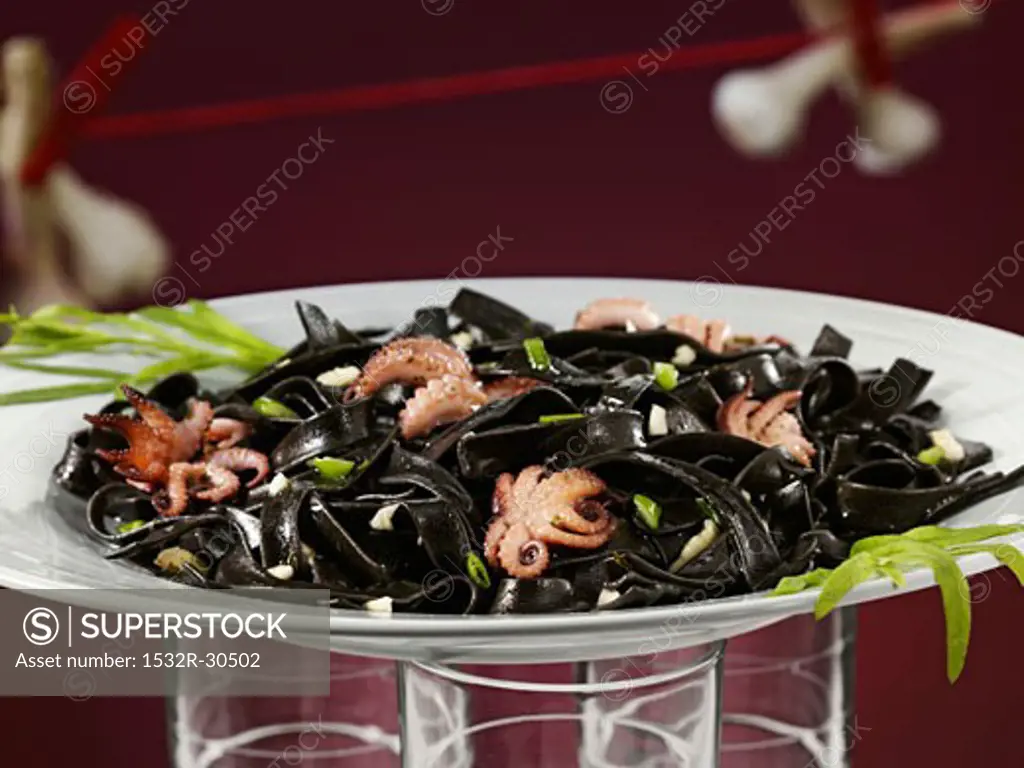 Black pasta with octopuses
