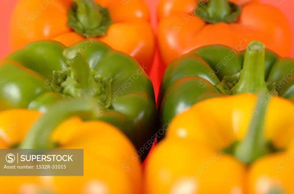 Yellow, green and orange peppers