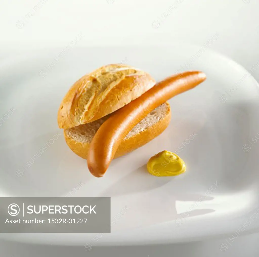 A Bockwurst in a bread roll with mustard